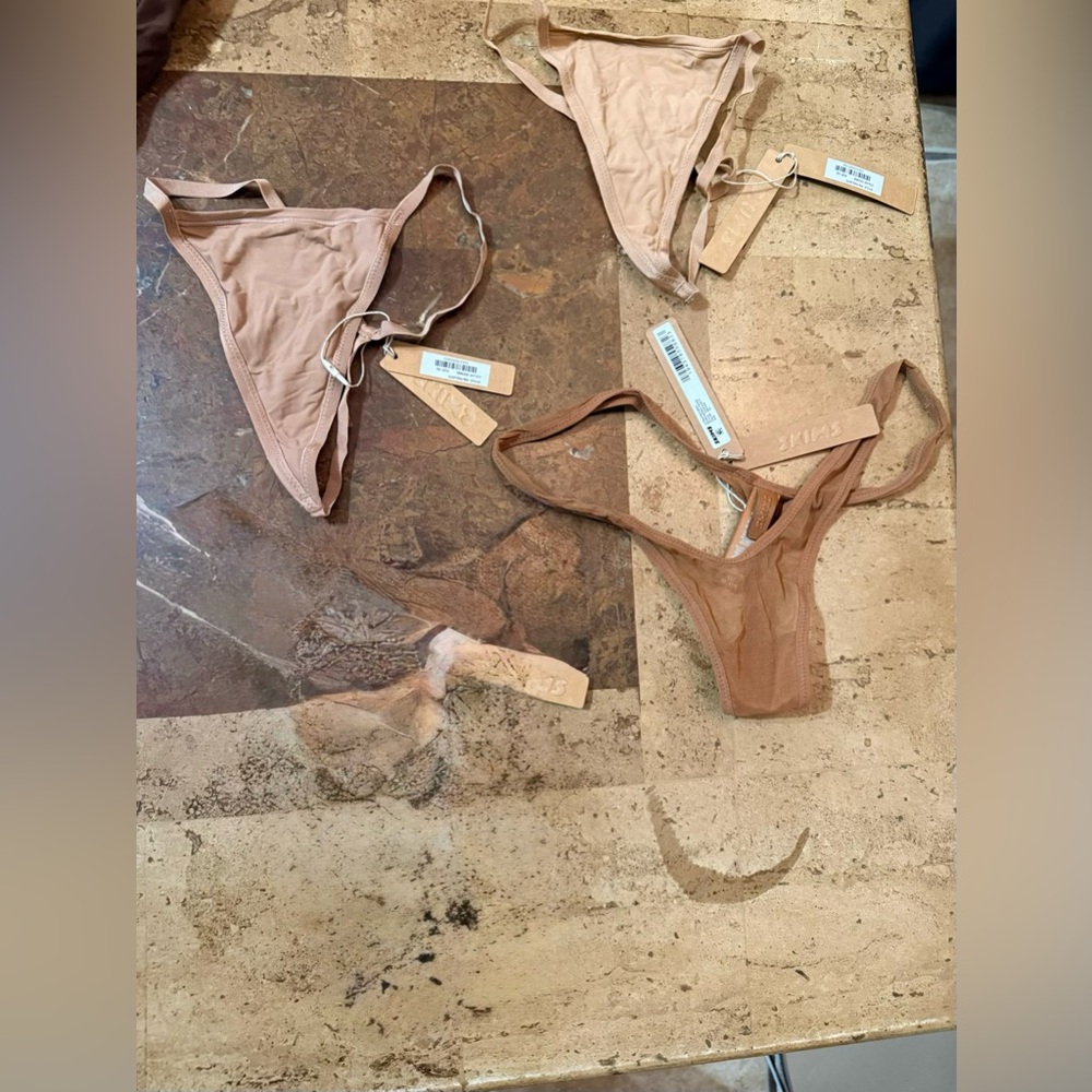 NWT SKIMS 3 piece string thong panties bundle.

LOT BIN 17
